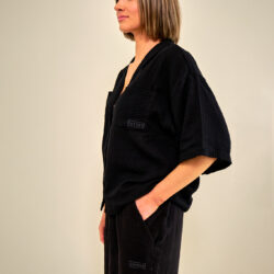 Cotone Collection short sleeve top in Black - Side view of short sleeve top in Black