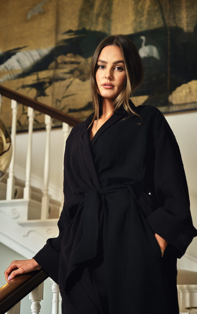Woman in black cotone collection dressing gown on stairs - Beautiful Black Dressing Gown